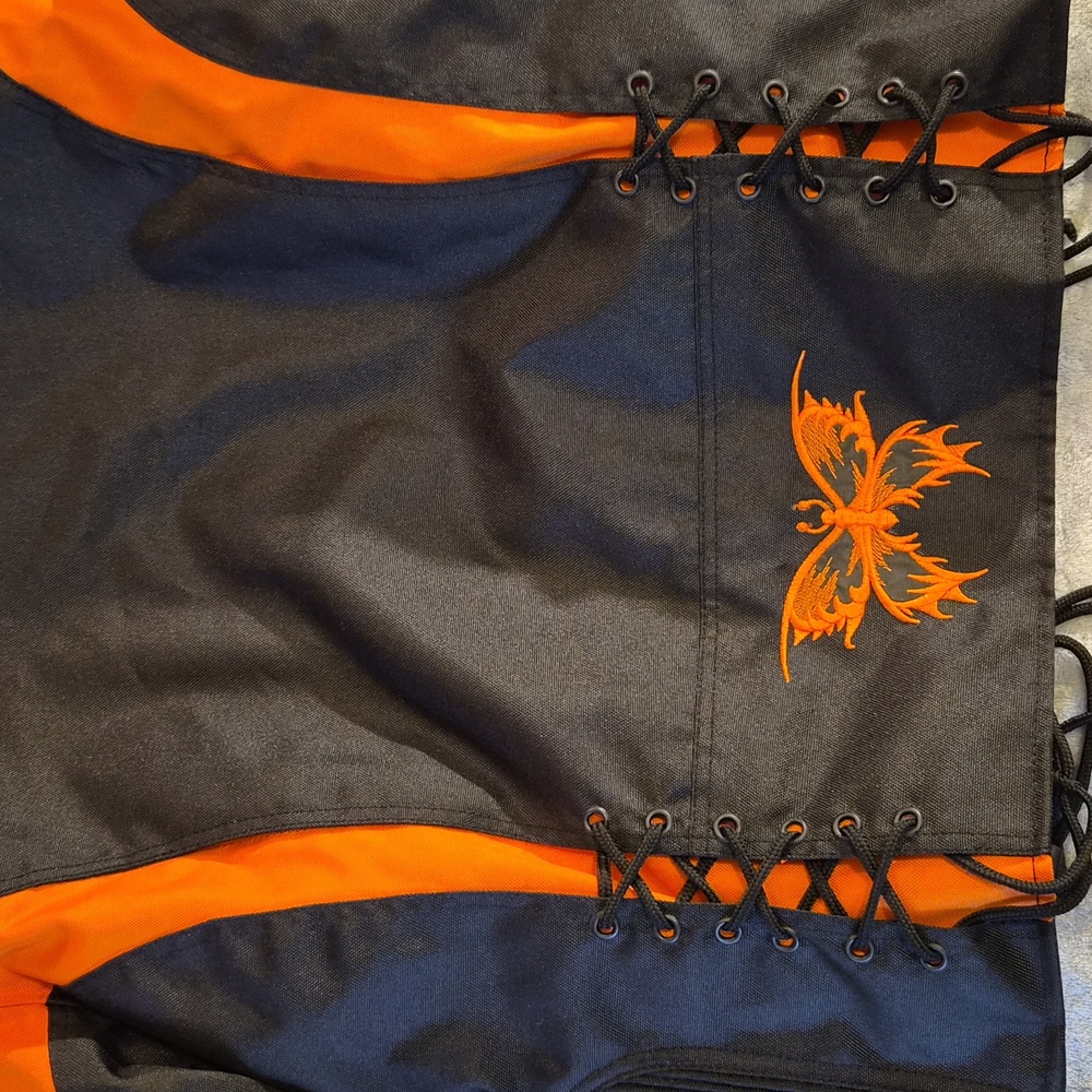 Revolution Gear Black Jacket with Vibrant Orange Details